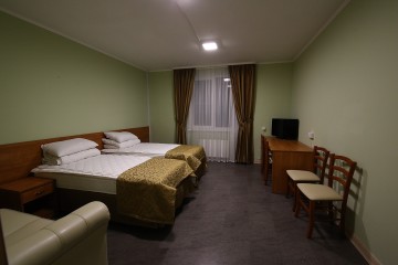 Комната Максима Парк Отель